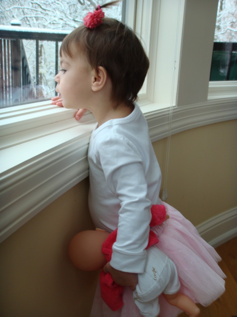 Liliana looking at snow